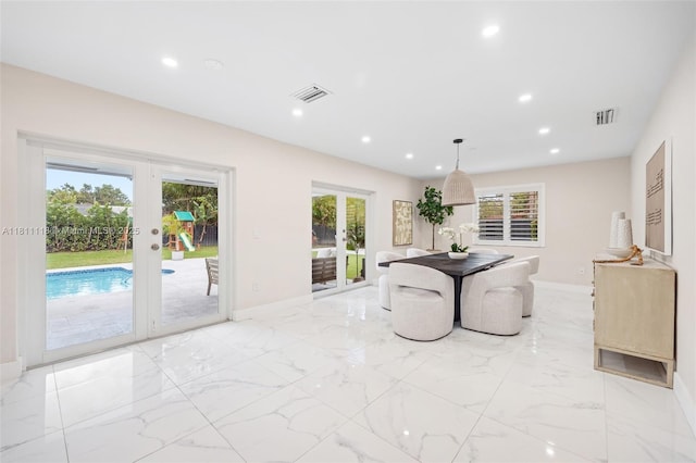17243 SW 87th Ave, Palmetto Bay, FL 33157 - dining room with french doors, baseboards, recessed lighting, and light marble finish floors
