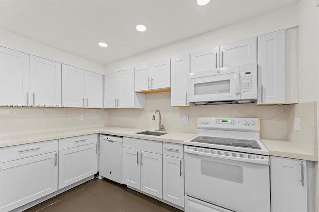 3253 Foxcroft Rd Unit G312, Miramar, FL 33025 - kitchen with white appliances, white cabinets, a sink, and recessed lighting