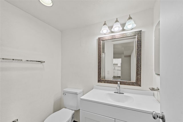 3253 Foxcroft Rd Unit G312, Miramar, FL 33025 - half bathroom featuring vanity and toilet