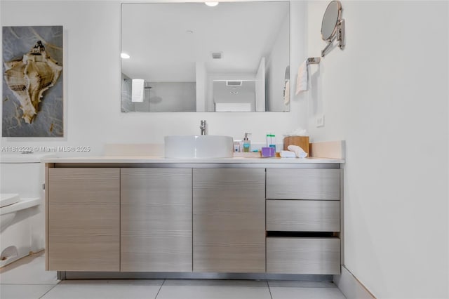 2602 E Hallandale Beach Blvd Unit R1009, Hallandale Beach, FL 33009 - bathroom with toilet, vanity, and tile patterned flooring