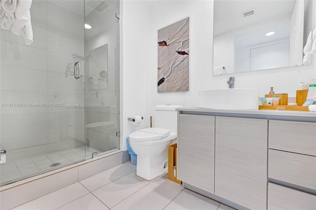 2602 E Hallandale Beach Blvd Unit R1009, Hallandale Beach, FL 33009 - full bathroom featuring toilet, vanity, a shower stall, and tile patterned floors