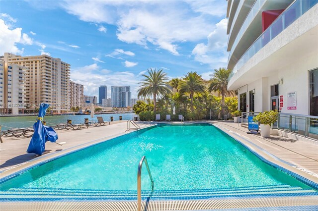 2602 E Hallandale Beach Blvd Unit R1009, Hallandale Beach, FL 33009 - community pool featuring a patio area