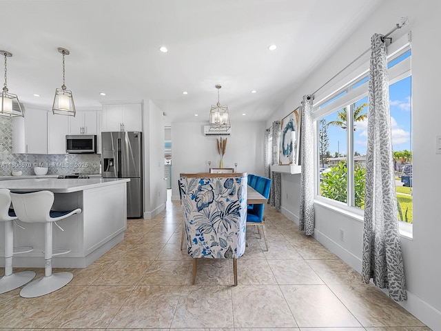 11755 SW 187th St, Miami, FL 33177 - dining space with a chandelier, recessed lighting, and baseboards