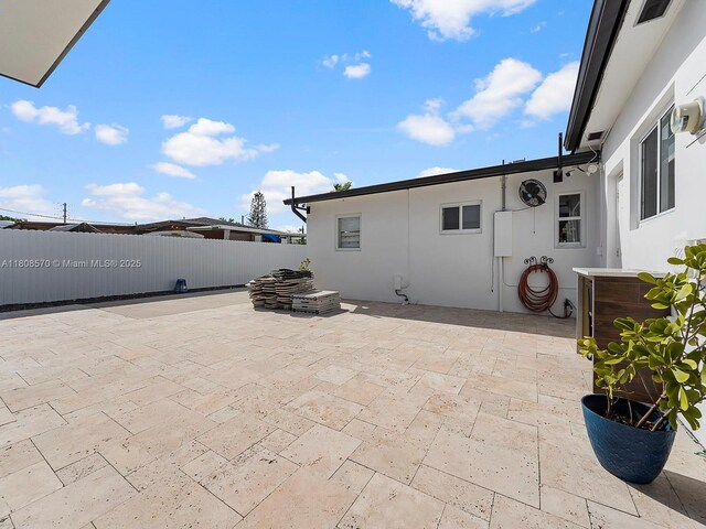 11755 SW 187th St, Miami, FL 33177 - fenced backyard with a patio