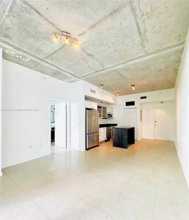 3470 E Coast Ave Unit H1006, Miami, FL 33137 - unfurnished living room featuring light tile patterned floors