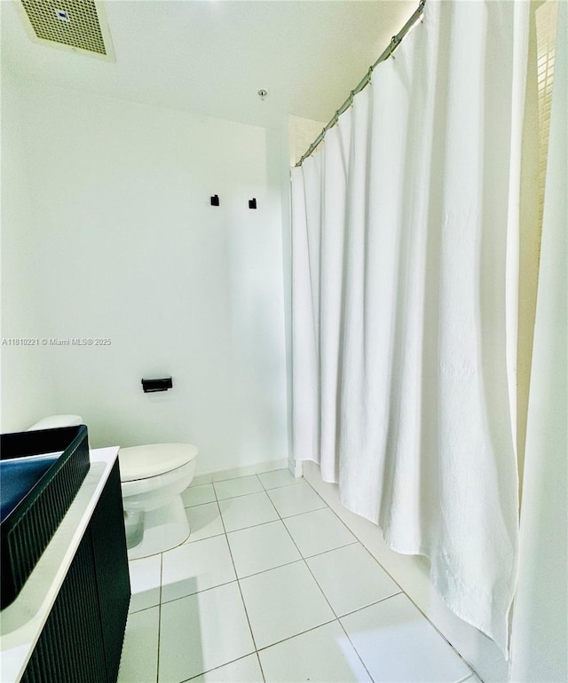 3470 E Coast Ave Unit H1006, Miami, FL 33137 - bathroom with toilet, tile patterned flooring, and a shower with shower curtain