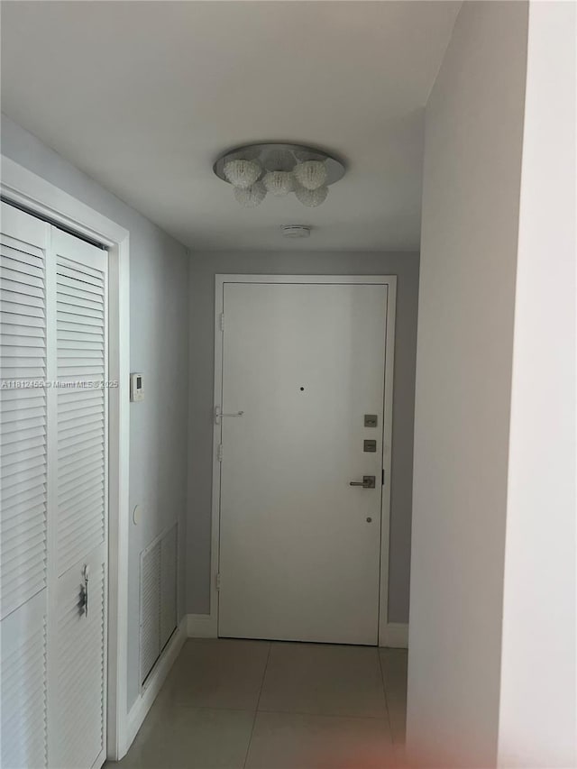 4330 Hillcrest Dr Unit 619, Hollywood, FL 33021 - hallway featuring light tile patterned floors and baseboards