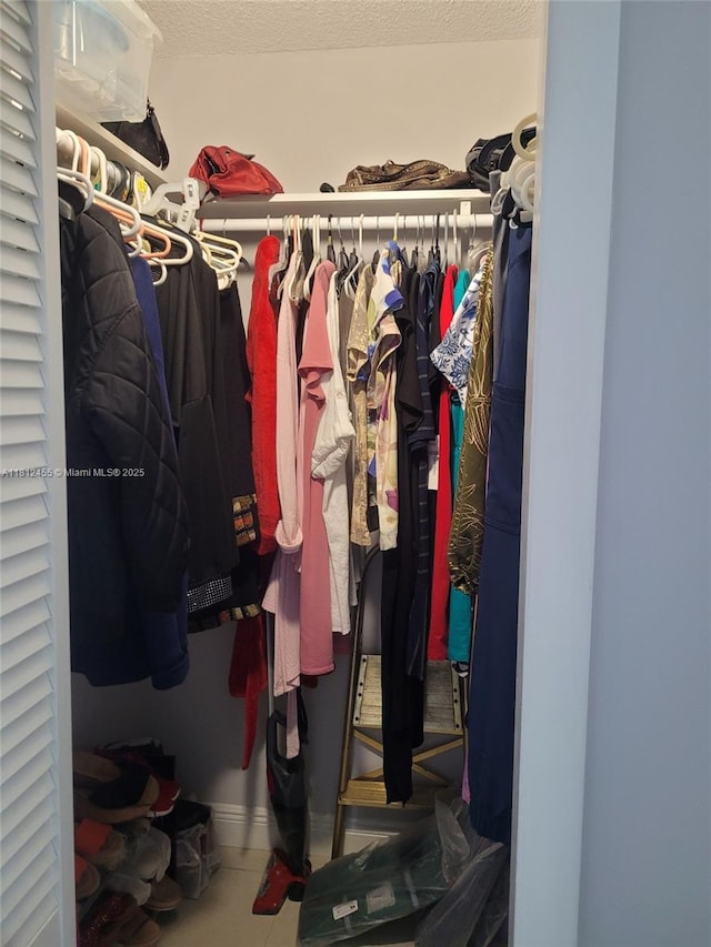 4330 Hillcrest Dr Unit 619, Hollywood, FL 33021 - spacious closet featuring tile patterned flooring