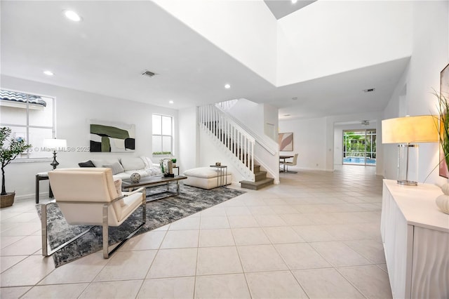 1906 Timberline Rd, Weston, FL 33327 - living area with stairway, recessed lighting, light tile patterned flooring, and baseboards