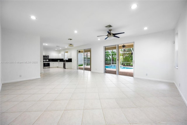 1906 Timberline Rd, Weston, FL 33327 - unfurnished living room featuring recessed lighting, ceiling fan, and baseboards