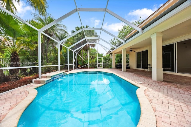 1906 Timberline Rd, Weston, FL 33327 - swimming pool featuring a patio area, ceiling fan, and glass enclosure