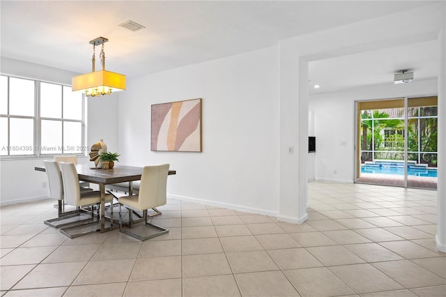 1906 Timberline Rd, Weston, FL 33327 - dining room with a chandelier, light tile patterned flooring, and recessed lighting