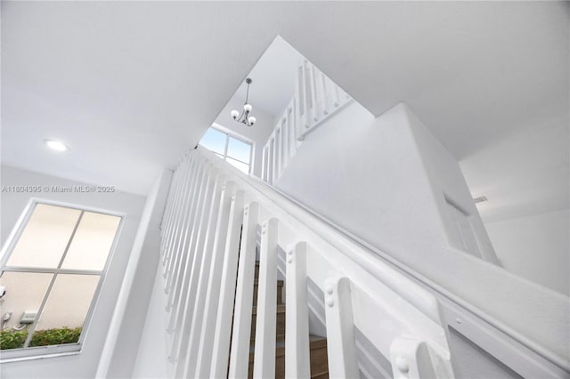 1906 Timberline Rd, Weston, FL 33327 - stairs featuring a chandelier
