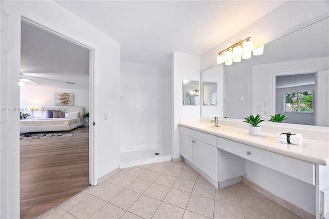 1906 Timberline Rd, Weston, FL 33327 - bathroom featuring vanity, tile patterned flooring, a walk in shower, and connected bathroom
