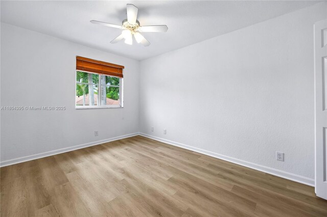 1906 Timberline Rd, Weston, FL 33327 - spare room featuring wood finished floors and ceiling fan