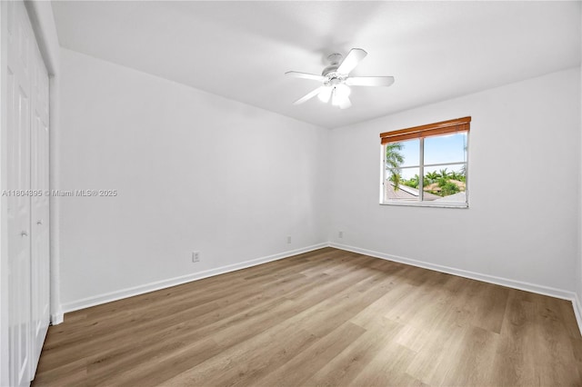 1906 Timberline Rd, Weston, FL 33327 - spare room with wood finished floors, baseboards, and a ceiling fan