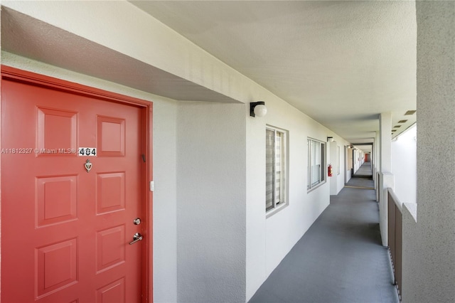 801 SW 138th Ave Unit 404E, Pembroke Pines, FL 33027 - doorway to property with stucco siding
