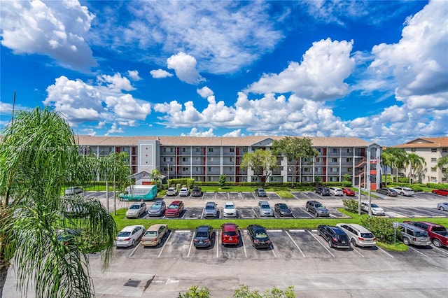 801 SW 138th Ave Unit 404E, Pembroke Pines, FL 33027 - view of apartment building / complex featuring uncovered parking