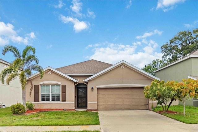 1070 Swiss Pointe Ln, Rockledge, FL 32955 - ranch-style house featuring stucco siding, an attached garage, driveway, and a front lawn