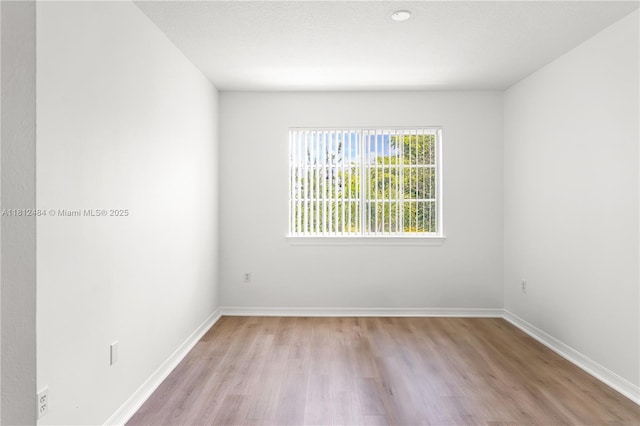 6821 SW 44th St Unit 302, Miami, FL 33155 - unfurnished room featuring light wood-style flooring and baseboards