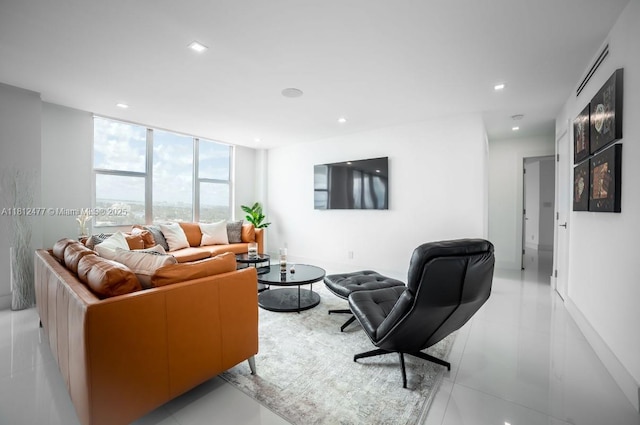 5600 Collins Ave Unit 14K, Miami Beach, FL 33140 - living area with recessed lighting and floor to ceiling windows