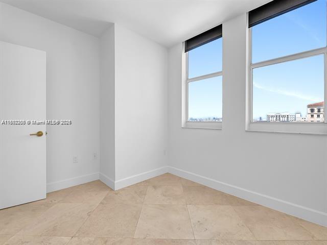 4100 Salzedo St Unit 901, Coral Gables, FL 33146 - spare room with baseboards