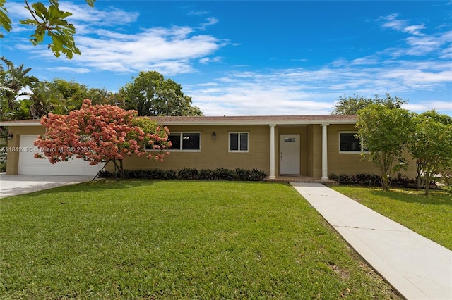 10421 NW 21st St, Pembroke Pines, FL 33026 - ranch-style home with concrete driveway, a front yard, and a garage