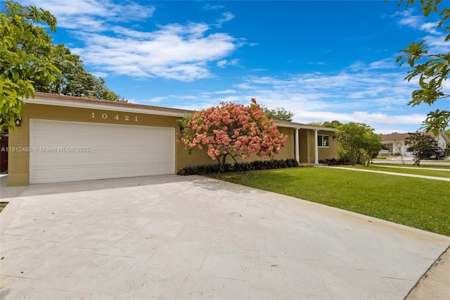 10421 NW 21st St, Pembroke Pines, FL 33026 - view of front of home featuring driveway, a front yard, and an attached garage