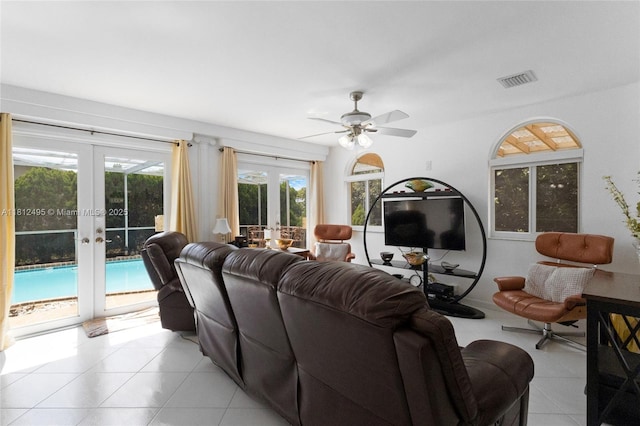 10421 NW 21st St, Pembroke Pines, FL 33026 - living room with french doors, light tile patterned flooring, and ceiling fan