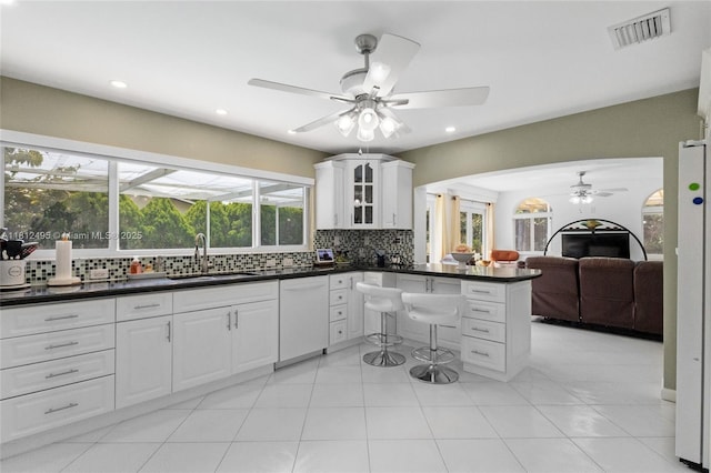 10421 NW 21st St, Pembroke Pines, FL 33026 - kitchen with a sink, white dishwasher, ceiling fan, tasteful backsplash, and open floor plan