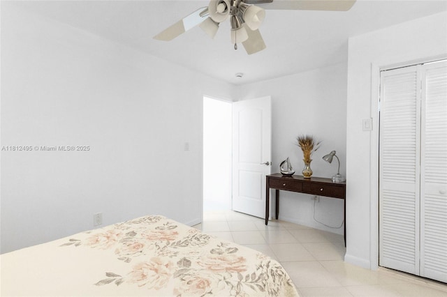 10421 NW 21st St, Pembroke Pines, FL 33026 - bedroom featuring light tile patterned flooring, baseboards, a ceiling fan, and a closet