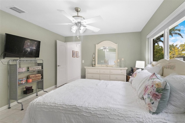10421 NW 21st St, Pembroke Pines, FL 33026 - bedroom featuring light tile patterned floors, ceiling fan, and baseboards