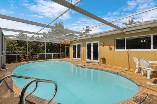 10421 NW 21st St, Pembroke Pines, FL 33026 - swimming pool featuring french doors, a patio area, and glass enclosure