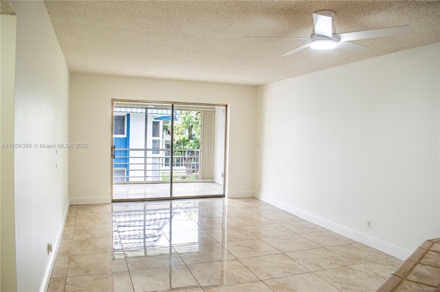 3090 Holiday Springs Blvd Unit 305, Margate, FL 33063 - empty room featuring a textured ceiling, baseboards, ceiling fan, and light tile patterned floors