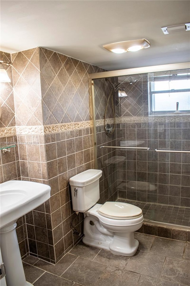 3090 Holiday Springs Blvd Unit 305, Margate, FL 33063 - bathroom with toilet, tile walls, a shower stall, and a sink