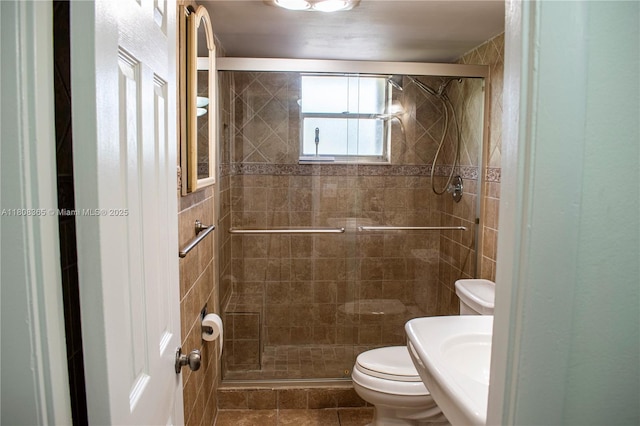 3090 Holiday Springs Blvd Unit 305, Margate, FL 33063 - bathroom with toilet, a stall shower, and tile patterned floors