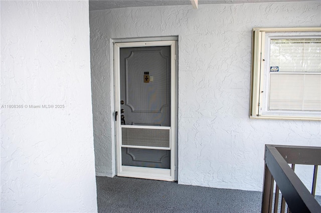 3090 Holiday Springs Blvd Unit 305, Margate, FL 33063 - doorway to property with stucco siding