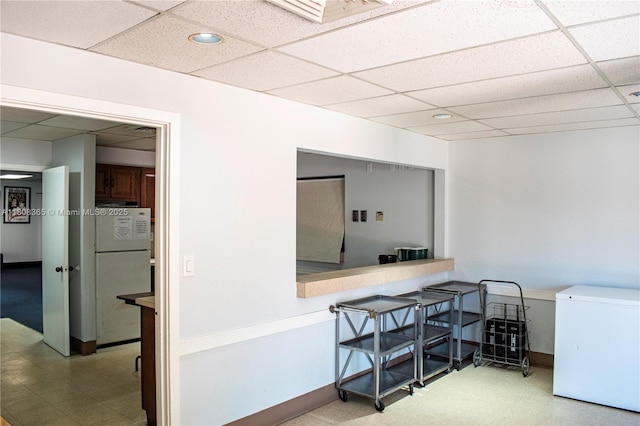 3090 Holiday Springs Blvd Unit 305, Margate, FL 33063 - office area featuring a drop ceiling, recessed lighting, and baseboards