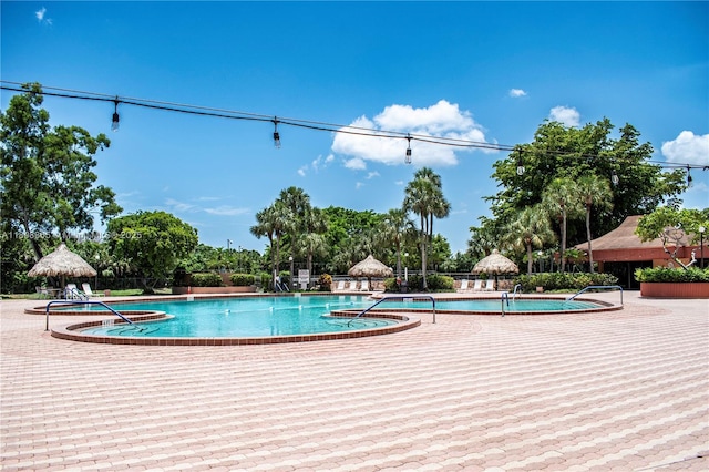 3090 Holiday Springs Blvd Unit 305, Margate, FL 33063 - community pool with a patio