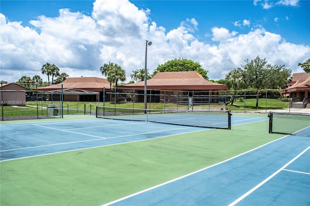3090 Holiday Springs Blvd Unit 305, Margate, FL 33063 - view of tennis court featuring community basketball court