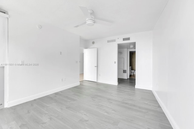 1750 N Bayshore Dr Unit 4801, Miami, FL 33132 - spare room with ceiling fan, baseboards, and light wood-style flooring