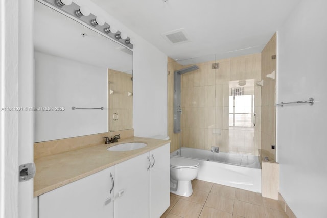 1750 N Bayshore Dr Unit 4801, Miami, FL 33132 - full bathroom featuring tile patterned flooring, toilet, vanity, and bath / shower combo with glass door