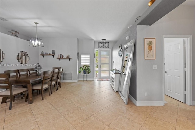 18342 NW 11th St, Pembroke Pines, FL 33029 - dining room with a chandelier, light tile patterned floors, and baseboards