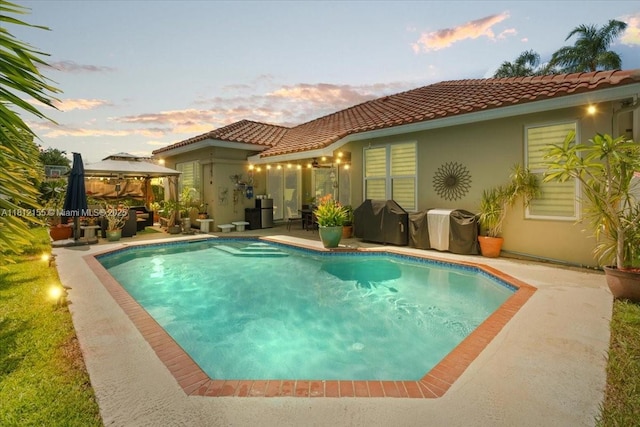 18342 NW 11th St, Pembroke Pines, FL 33029 - swimming pool with a gazebo, a patio, and grilling area