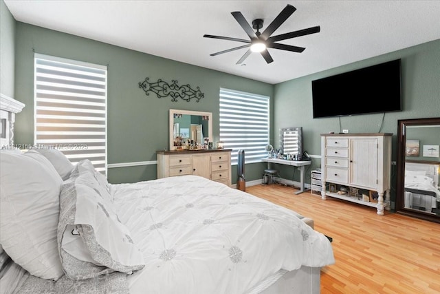 18342 NW 11th St, Pembroke Pines, FL 33029 - bedroom with wood finished floors, ceiling fan, and baseboards