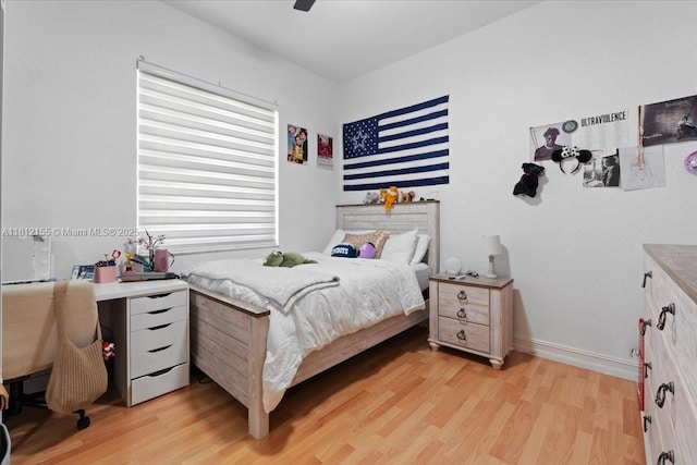 18342 NW 11th St, Pembroke Pines, FL 33029 - bedroom featuring light wood finished floors, a ceiling fan, and baseboards