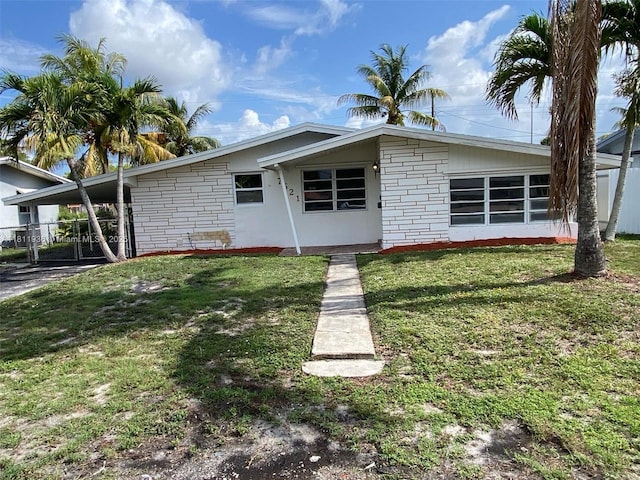 7521 Granada Blvd, Miramar, FL 33023 - view of front of home featuring a carport