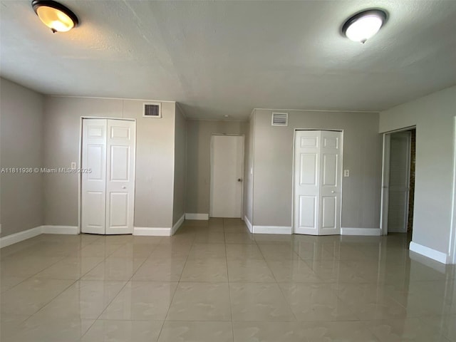 7521 Granada Blvd, Miramar, FL 33023 - empty room featuring baseboards and a textured ceiling