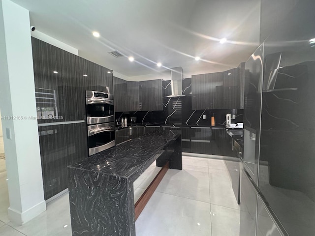 10003 NW 89th Ter, Doral, FL 33178 - kitchen featuring modern cabinets, wall chimney exhaust hood, stainless steel double oven, a kitchen island, and light tile patterned floors