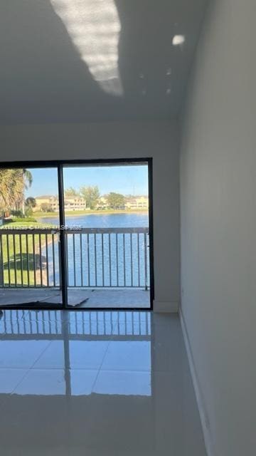 5200 NW 31st Ave Unit 14, Fort Lauderdale, FL 33309 - interior space featuring baseboards and a water view